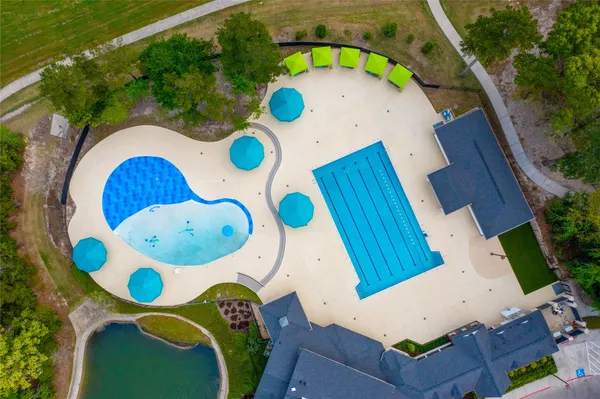 an aerial view of a kitchen tables and a fireplace