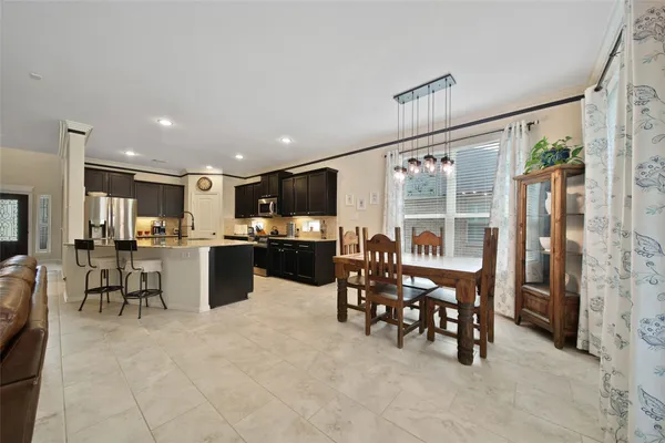 a view of a dining area with furniture window and outside view