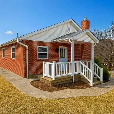 a front view of a house with a porch
