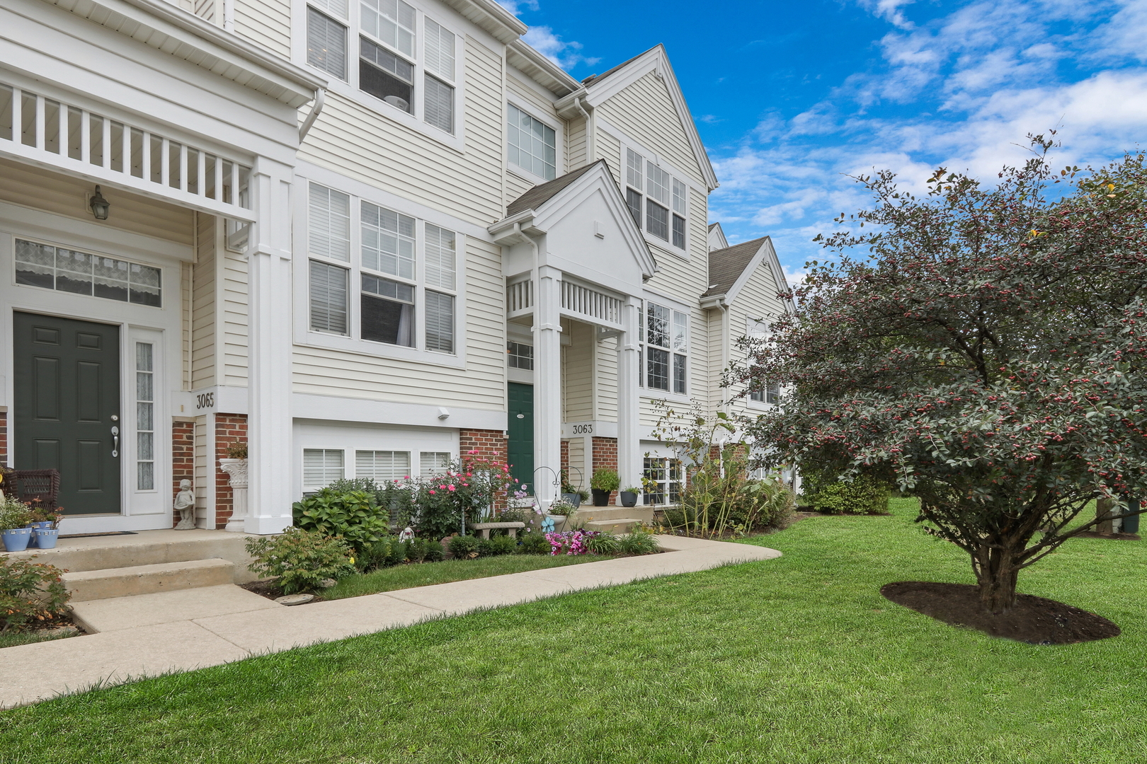 3063 Concord Lane Wadsworth, IL 60083 - Photo 1 of 1 a front view of a house with a yard