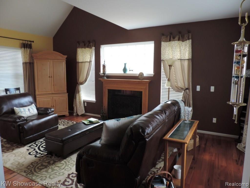 2531 Ravine Side North Howell, MI 48843 - Photo 5 of 41 Cozy up to the fireplace