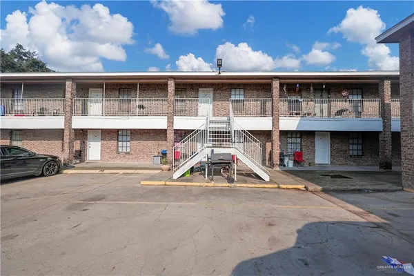 a view of large building with a yard
