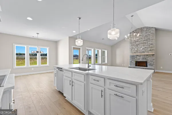 a view of a livingroom with a ceiling fan