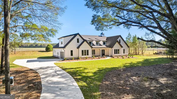 a view of a house with a swimming pool