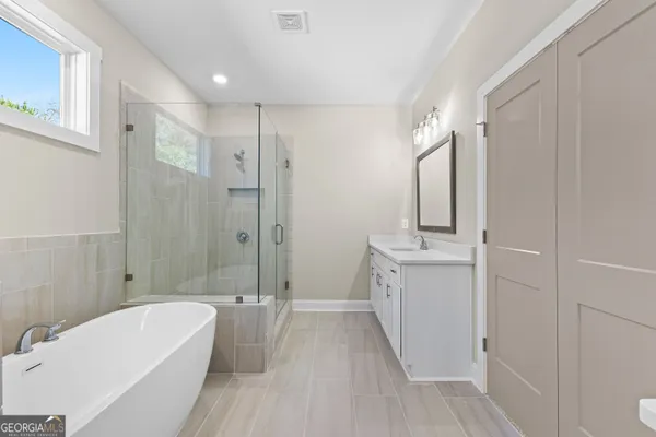 a view of an empty room with a window