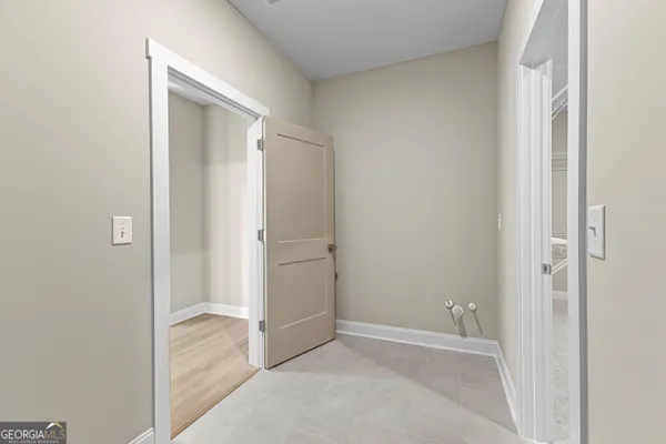 a view of a room with a big yard