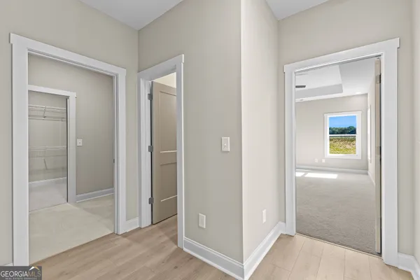 a house view with swimming pool in front of it