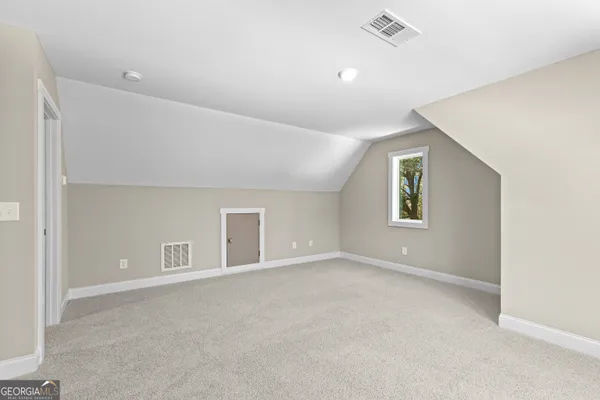 a view of a street with houses