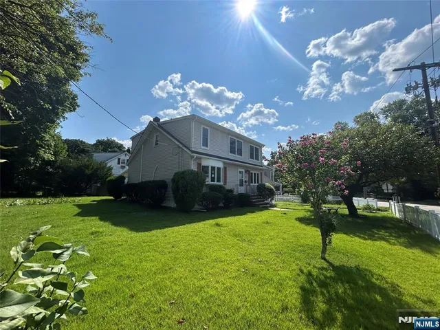 a house view with a garden space