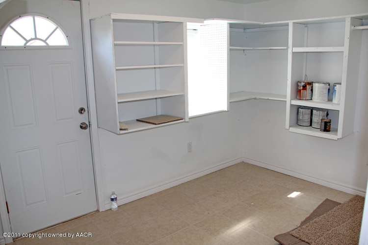 4612 Parker Street Amarillo, TX 79110 - Photo 15 of 17 a view of an empty room with a window