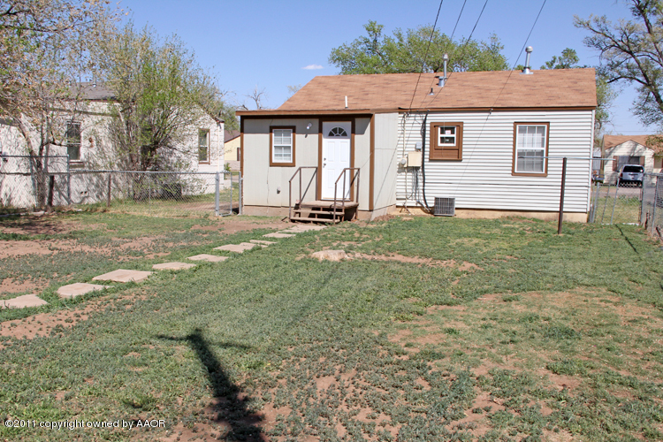 4612 Parker Street Amarillo, TX 79110 - Photo 17 of 17 a backyard of a house with seating space