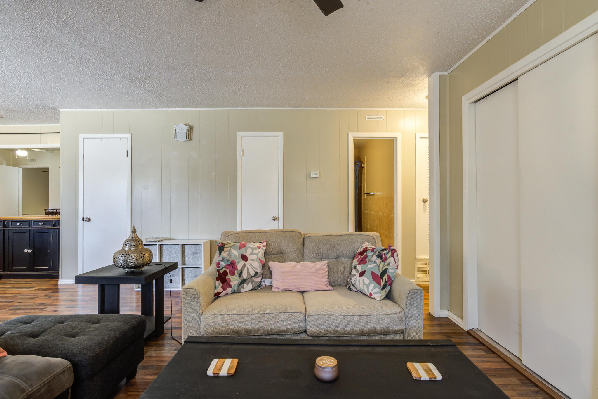 2812 62nd Street Lubbock, TX 79413 - Photo 11 of 45 a living room with furniture and a couch