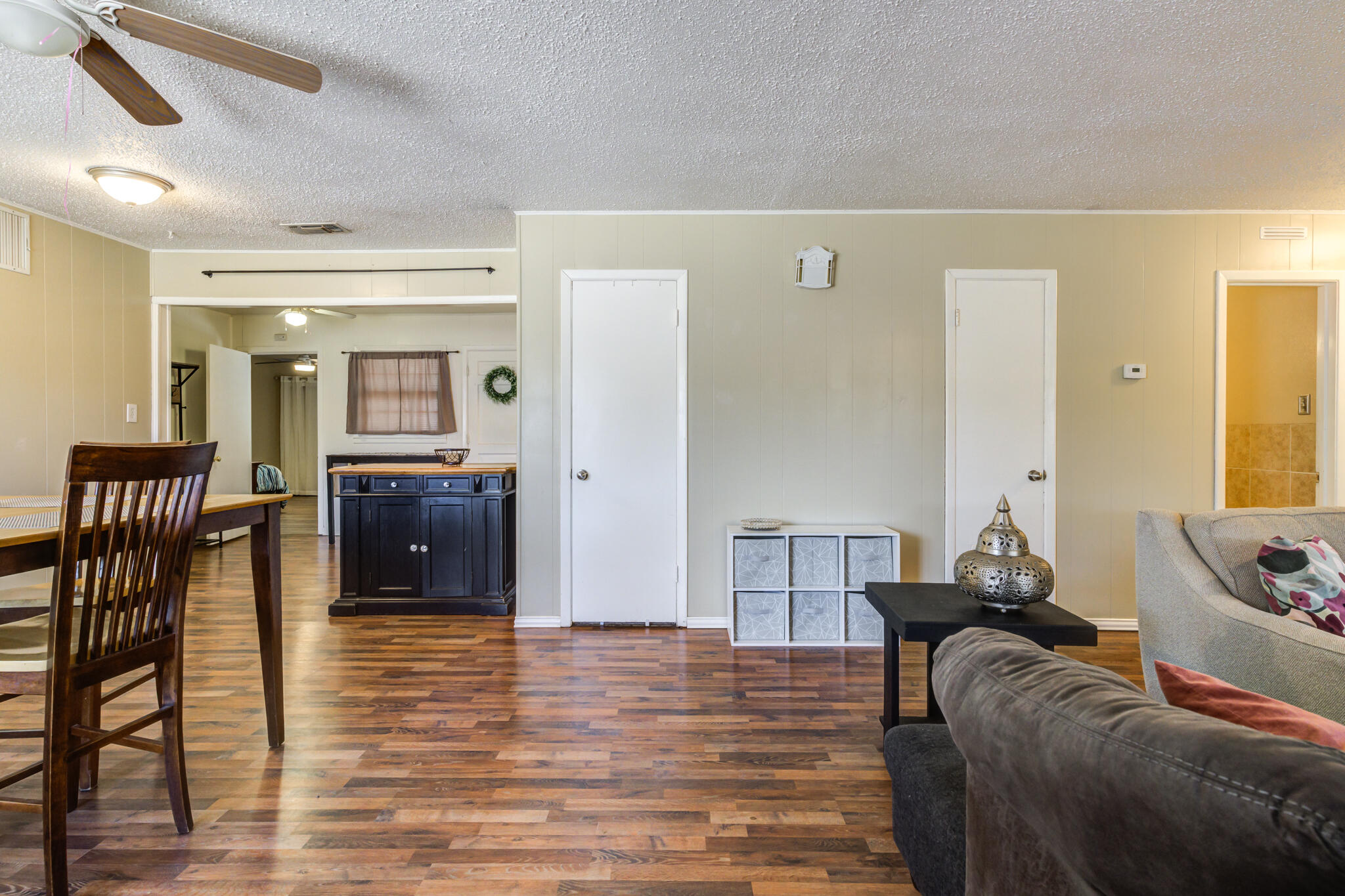 2812 62nd Street Lubbock, TX 79413 - Photo 15 of 45 a living room with furniture and a wooden floor