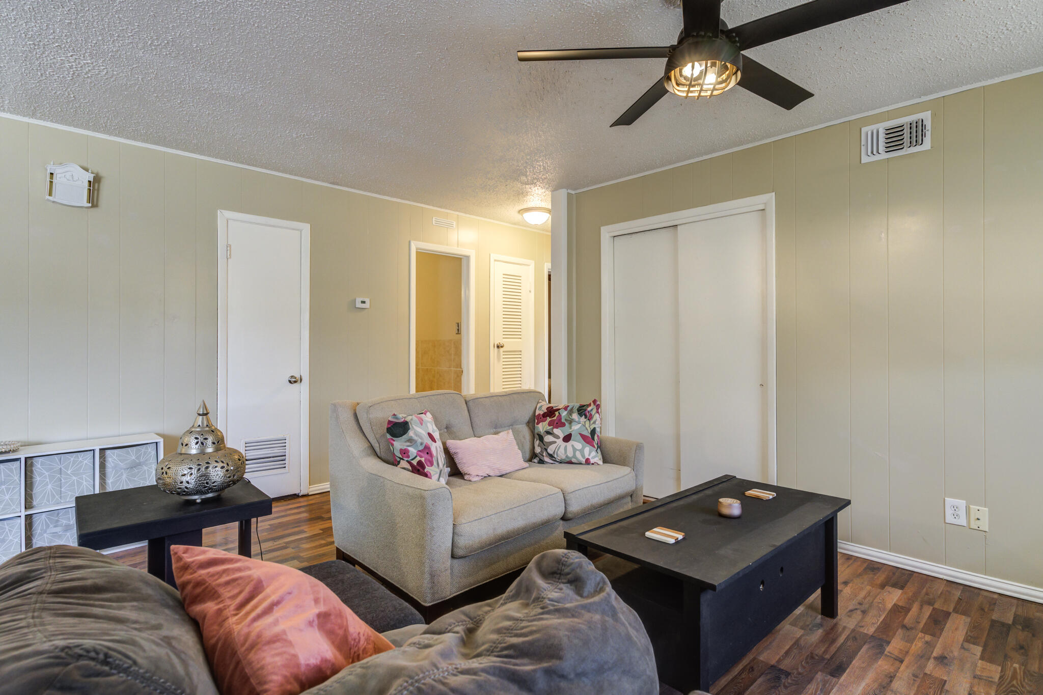 2812 62nd Street Lubbock, TX 79413 - Photo 2 of 45 a living room with furniture and a window