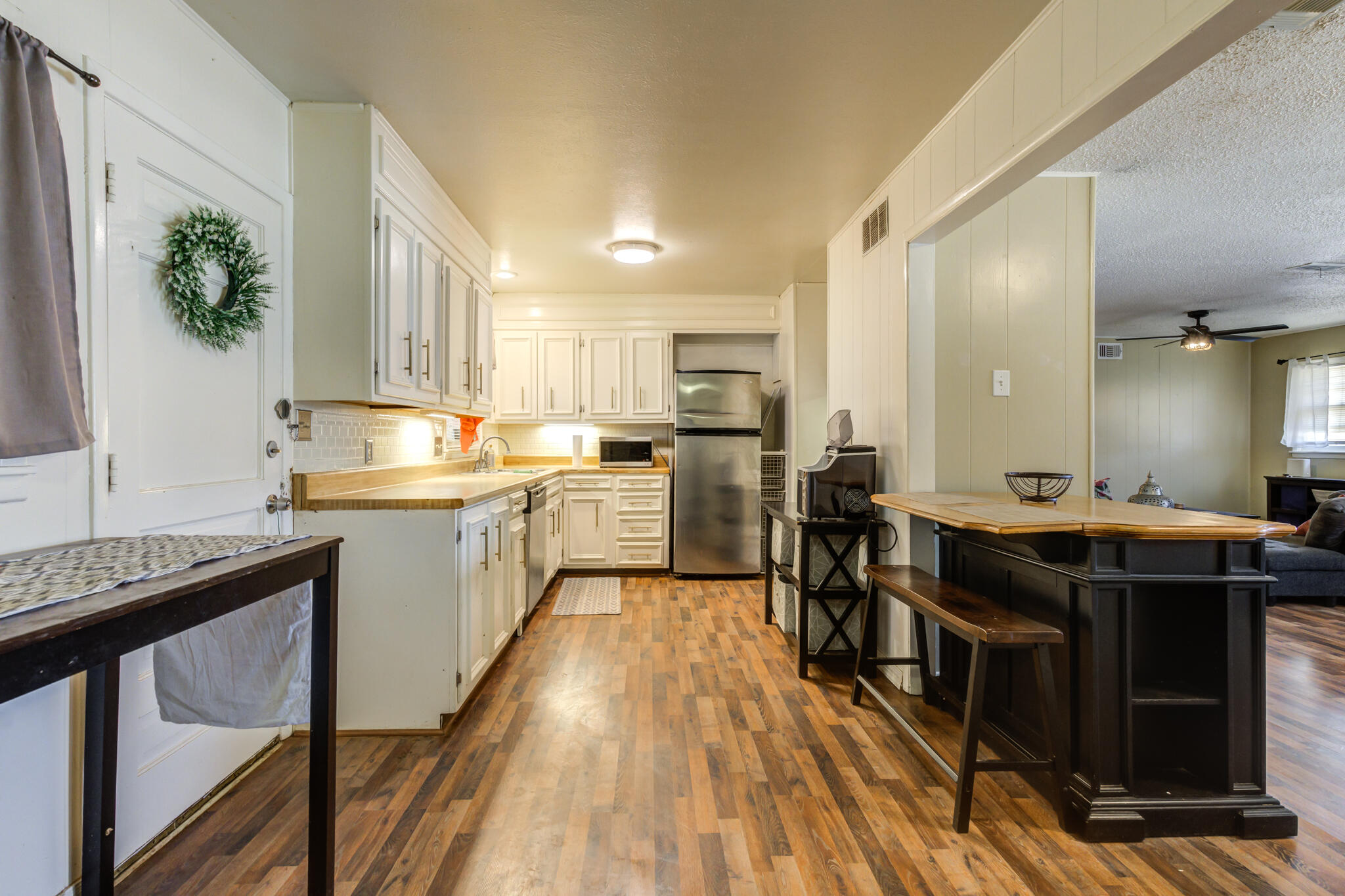 2812 62nd Street Lubbock, TX 79413 - Photo 24 of 45 a kitchen with a sink stove and cabinets