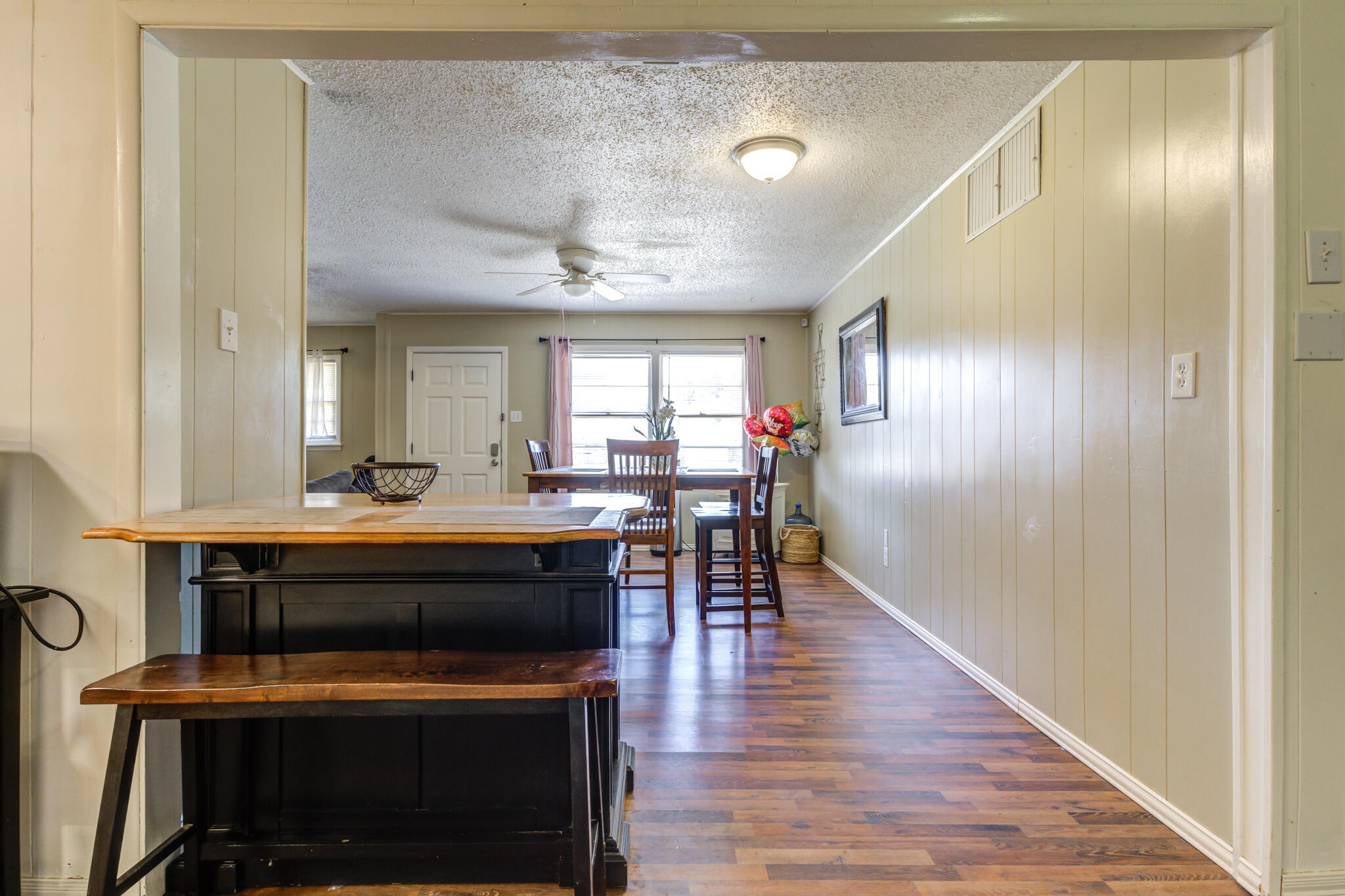 2812 62nd Street Lubbock, TX 79413 - Photo 25 of 45 a view of kitchen with furniture and wooden floor