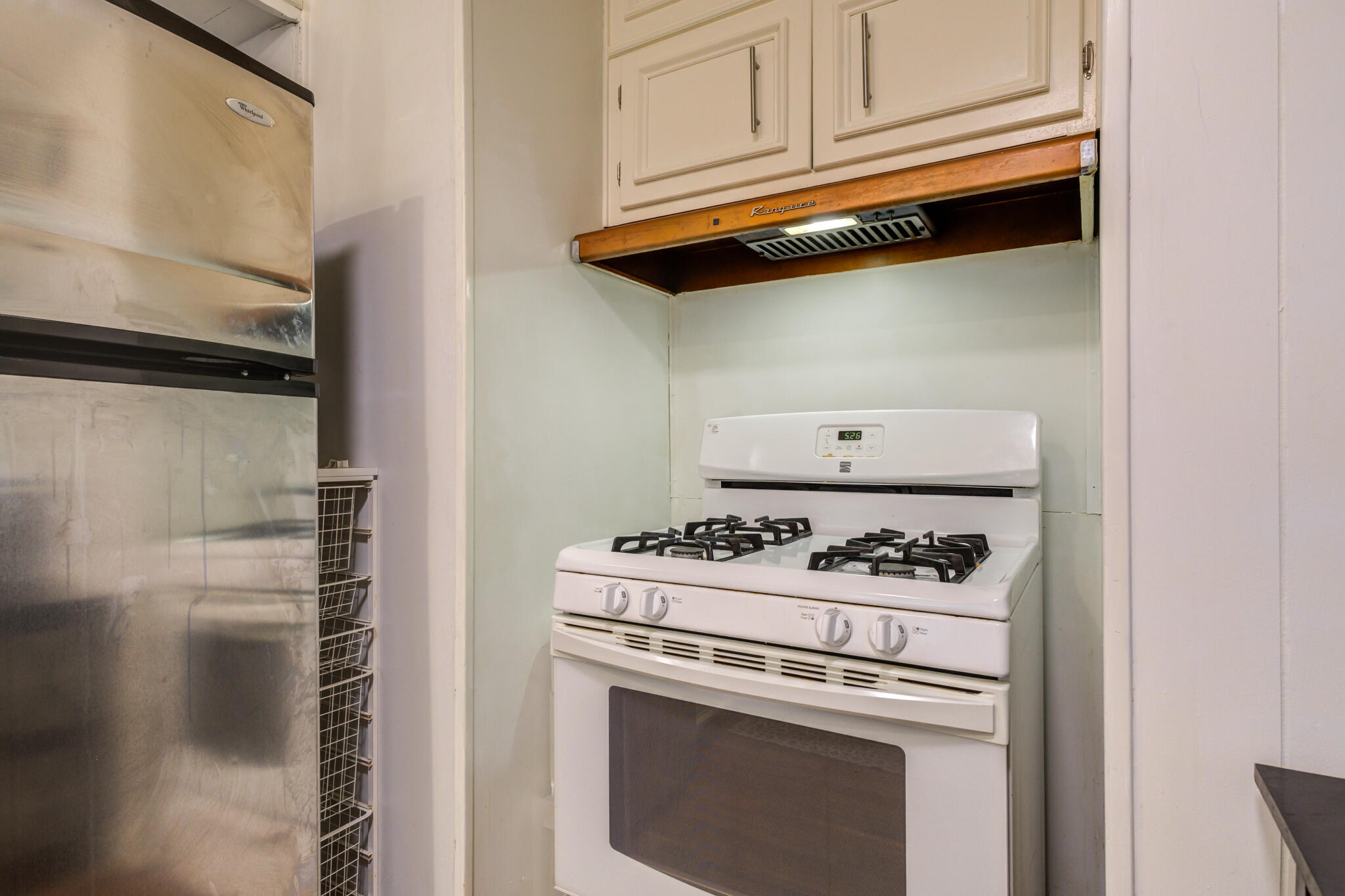 2812 62nd Street Lubbock, TX 79413 - Photo 30 of 45 a stove top oven sitting inside of a kitchen