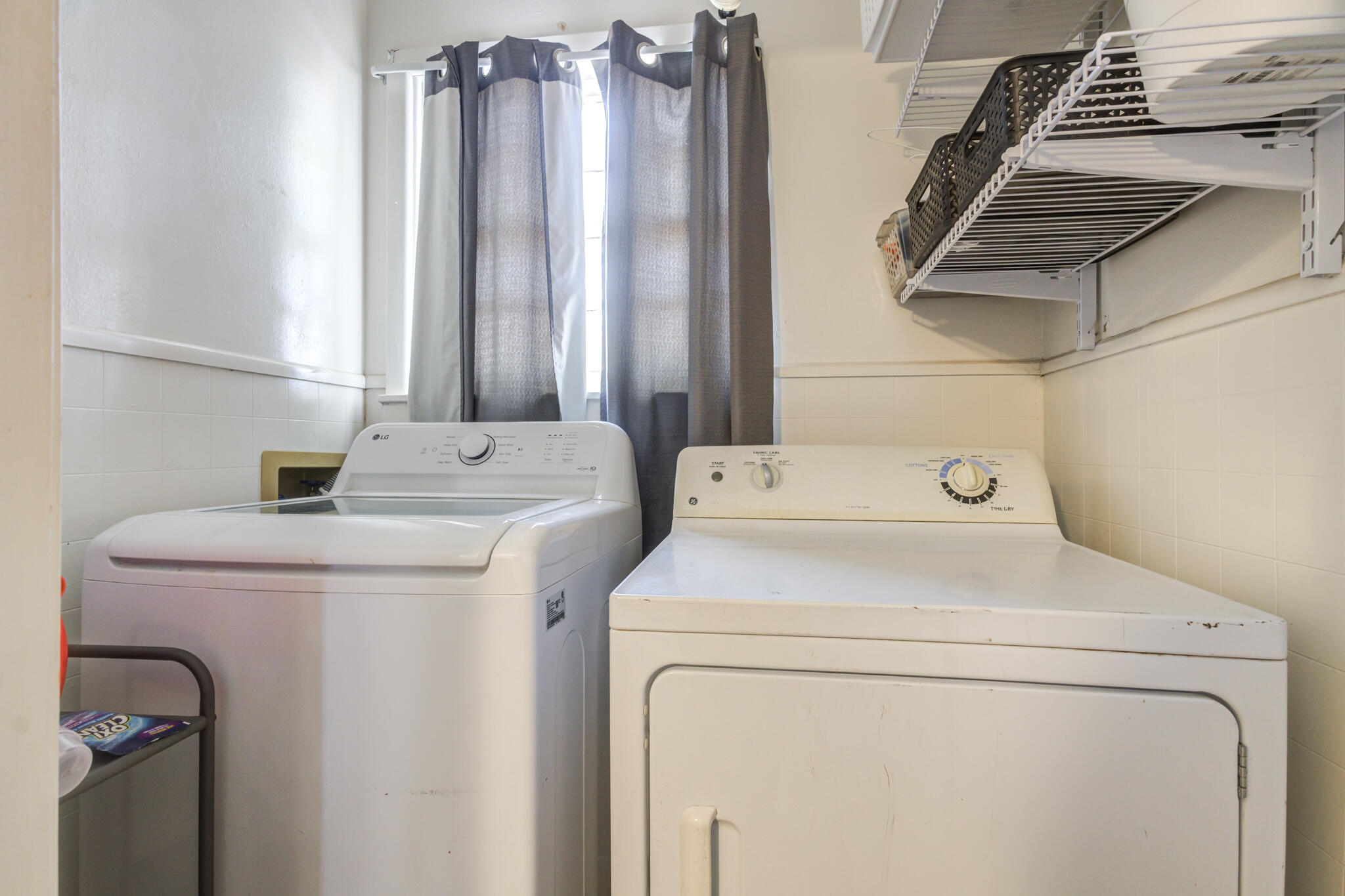 2812 62nd Street Lubbock, TX 79413 - Photo 33 of 45 a utility room with dryer and washer