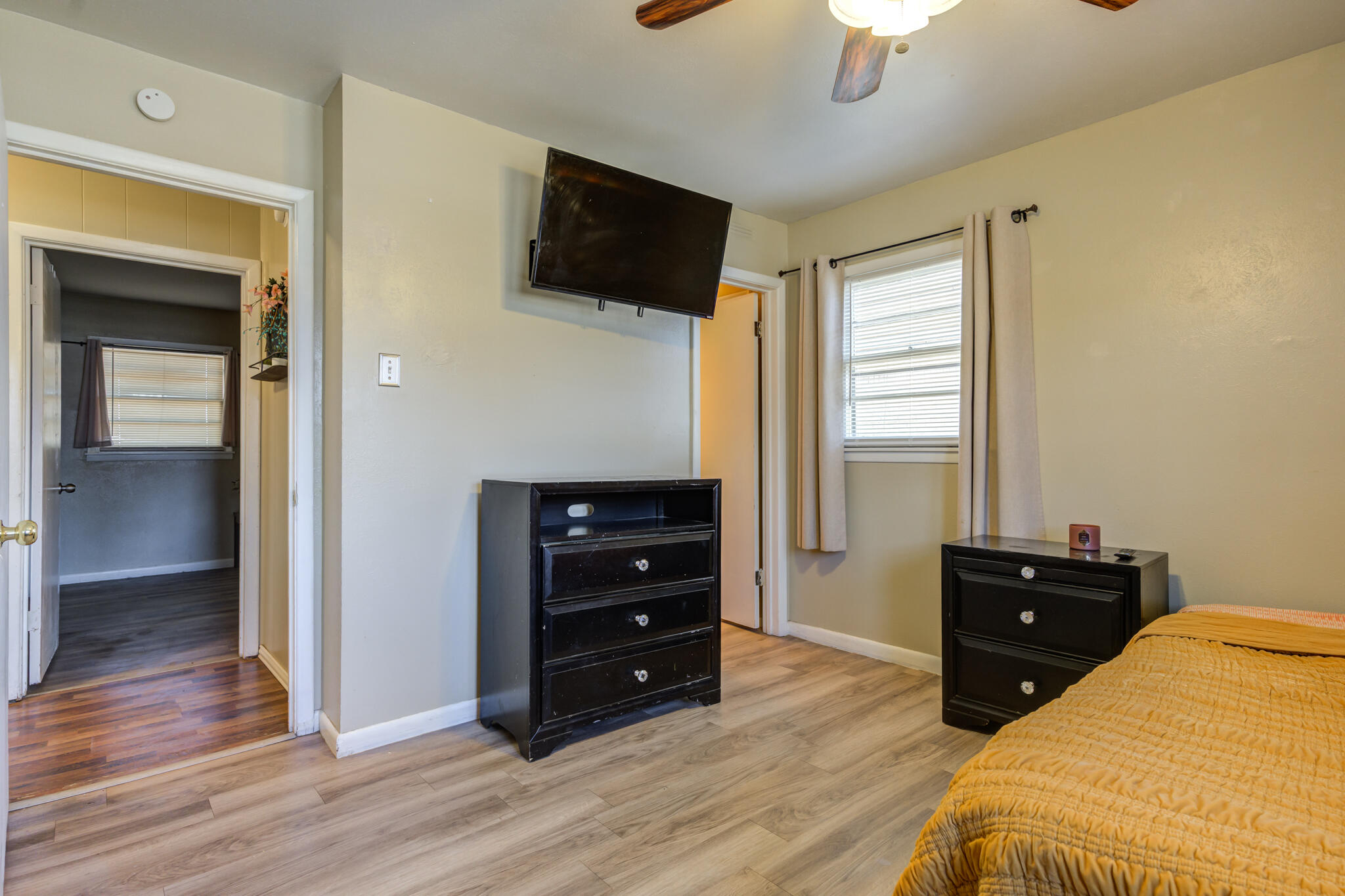 2812 62nd Street Lubbock, TX 79413 - Photo 38 of 45 a bedroom with a bed and a television