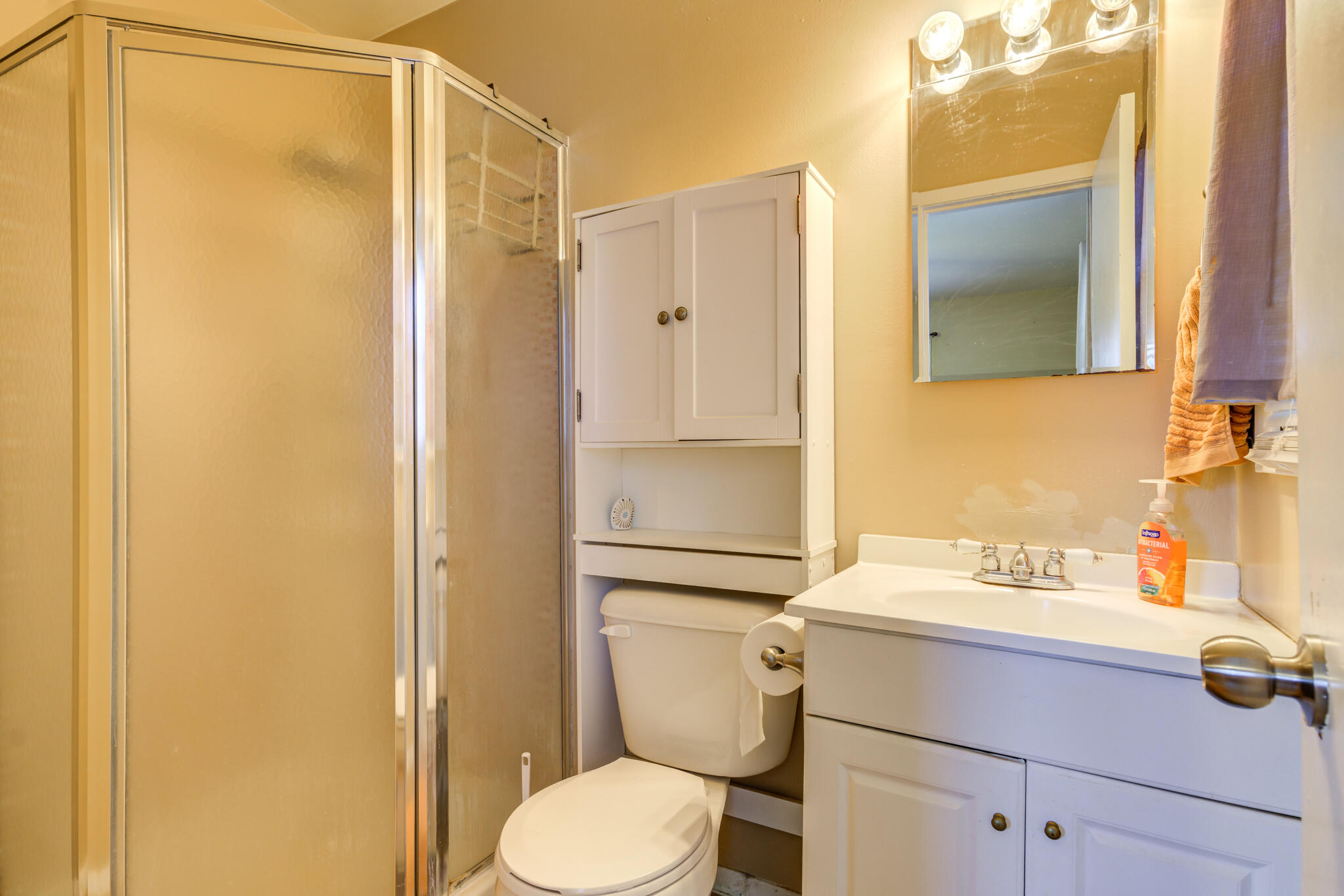 2812 62nd Street Lubbock, TX 79413 - Photo 39 of 45 a bathroom with a sink toilet and shower