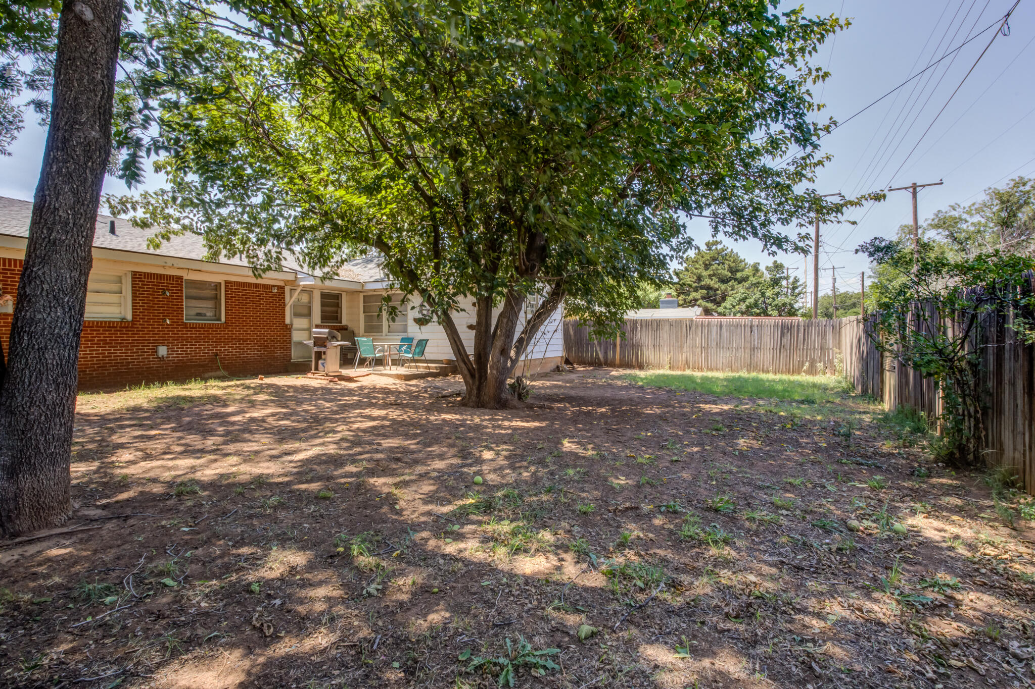 2812 62nd Street Lubbock, TX 79413 - Photo 44 of 45 a view of a house with yard and tree s