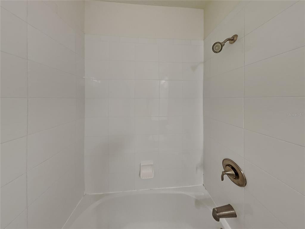 8326 Bryce Canyon Avenue Windermere, FL 34786 - Photo 17 of 20 a bathroom with a shower