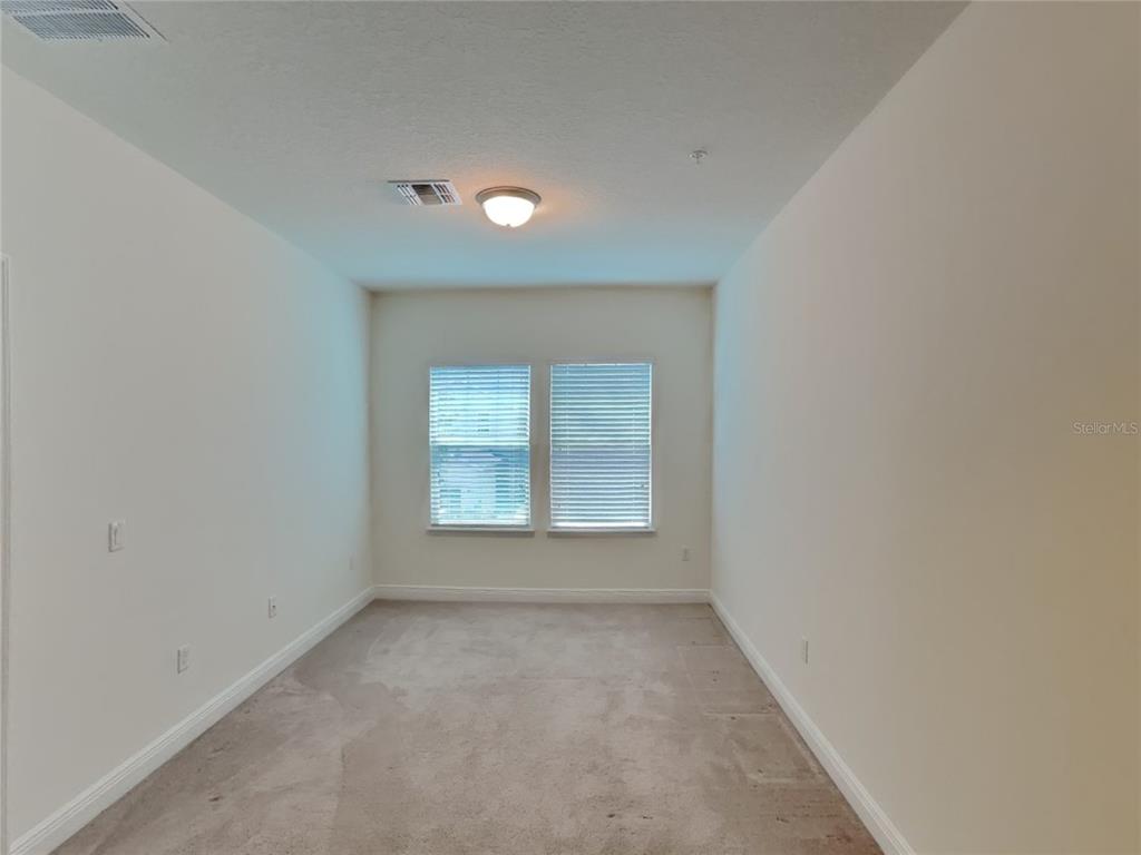 8326 Bryce Canyon Avenue Windermere, FL 34786 - Photo 20 of 20 an empty room with a window
