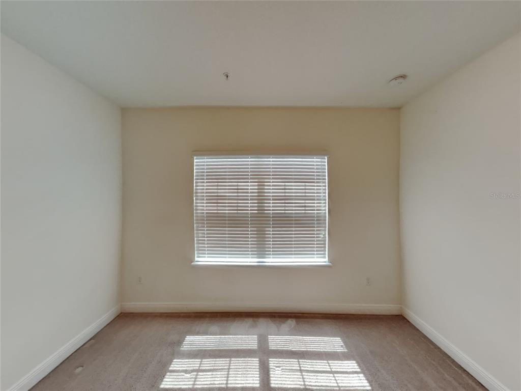 8326 Bryce Canyon Avenue Windermere, FL 34786 - Photo 9 of 20 a view of an empty room with a window