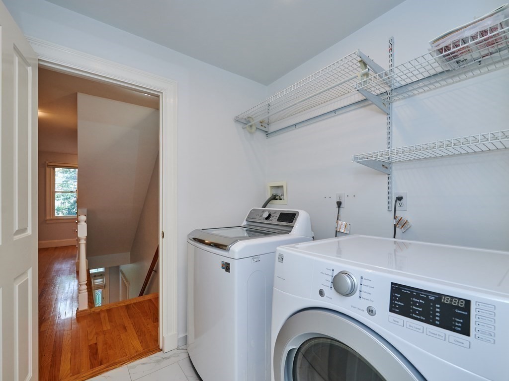 20 Garland Road Newton, MA 02459 - Photo 24 of 41 a utility room with dryer and washer