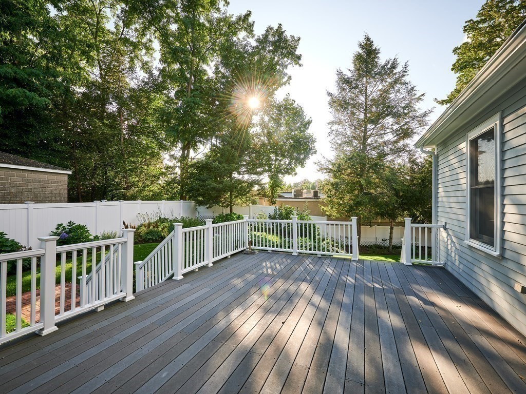 20 Garland Road Newton, MA 02459 - Photo 32 of 41 a view of deck with furniture and trees