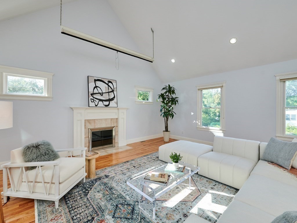 20 Garland Road Newton, MA 02459 - Photo 9 of 41 a living room with furniture and a fireplace