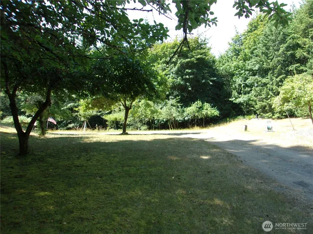 a house with trees in front of it