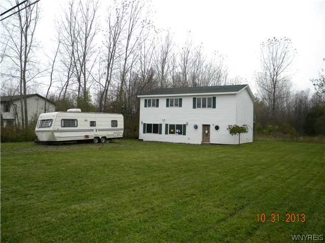 2424 Fuller Road Newfane, NY 14028 - Photo 1 of 1 Exterior Front. The lot is 125 x 640 .