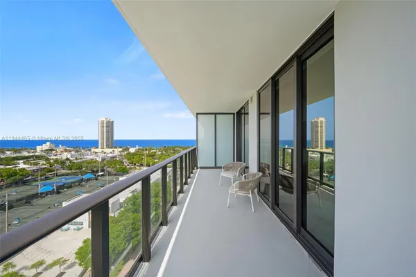 a view of a balcony with city view