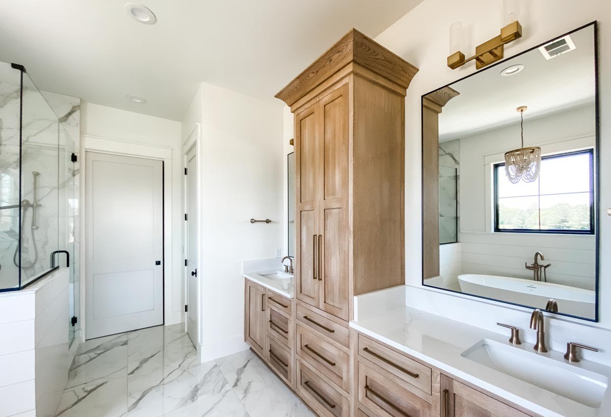 4995 Ward Bend Road Sealy, TX 77474 - Photo 11 of 12 a spacious bathroom with a shower sink and mirror