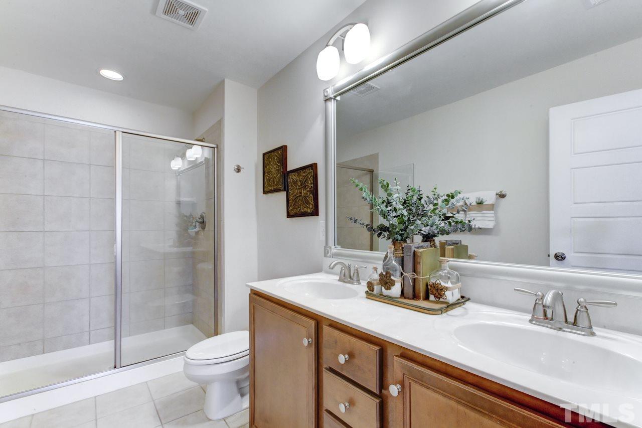 7831 Allscott Way Raleigh, NC 27612 - Photo 5 of 7 Master Bath has a, DOUBLE VANITY, separate shower and GARDEN TUB.