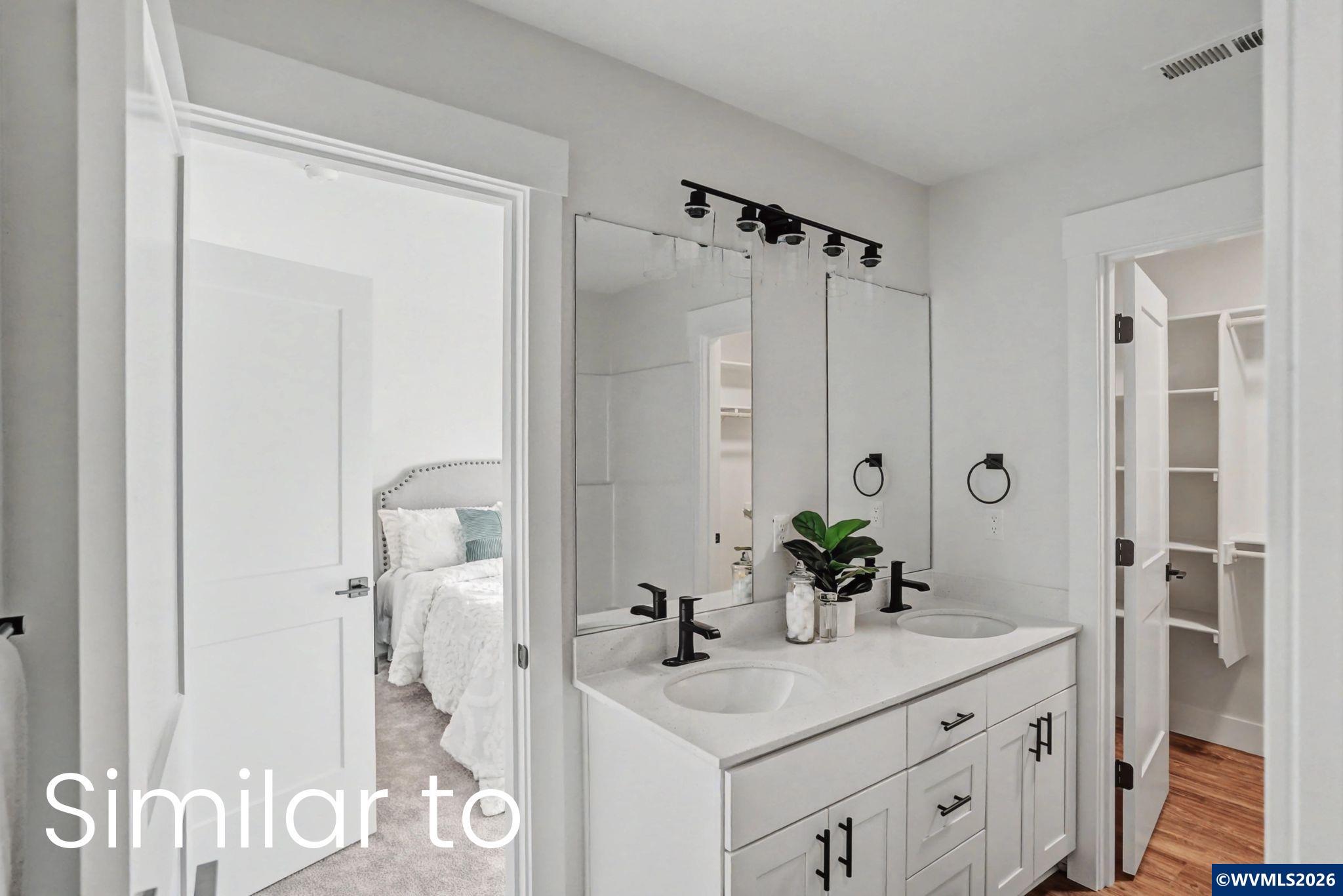2550 Promise Way Lebanon, OR 97355 - Photo 23 of 35 a bathroom with a sink vanity tub and shower