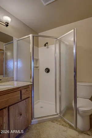 a view of hallway with wooden floor