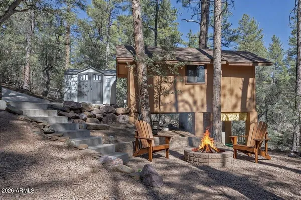 a house with trees in front of it