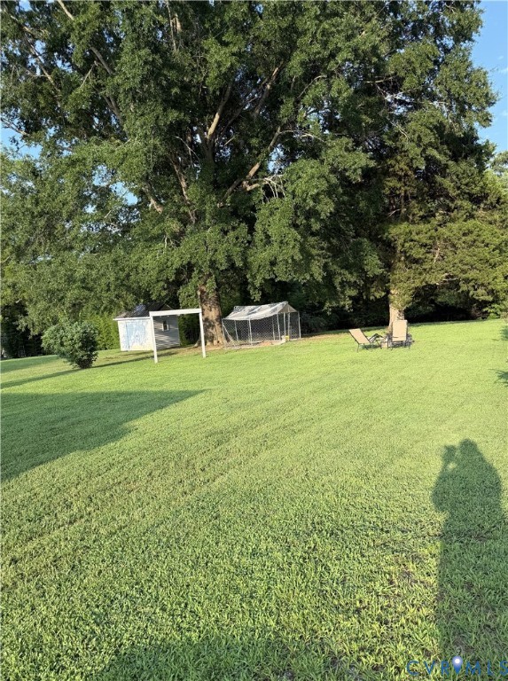 206 Germantown Road Farmville, VA 23901 - Photo 4 of 18 Expansive green lawn with mature trees and a secon