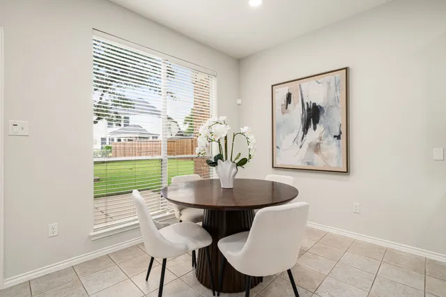 a bathroom with a sink a mirror and a toilet