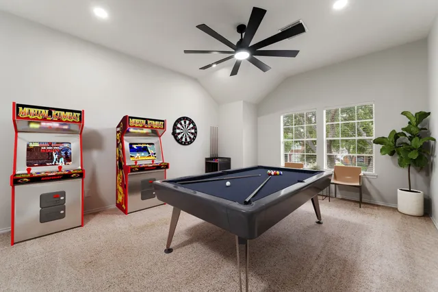 an empty room with windows and entrance