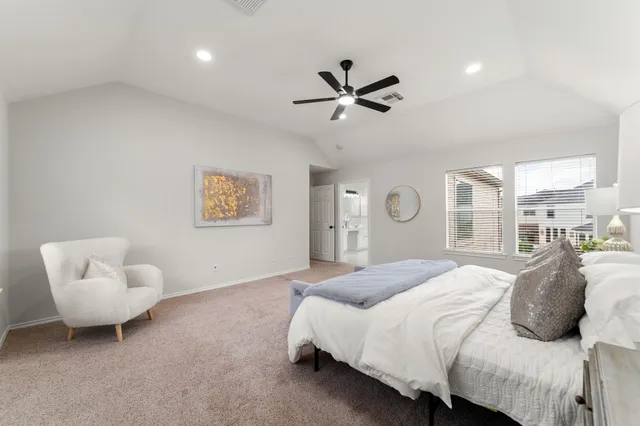 a spacious bathroom with a bathtub and a shower