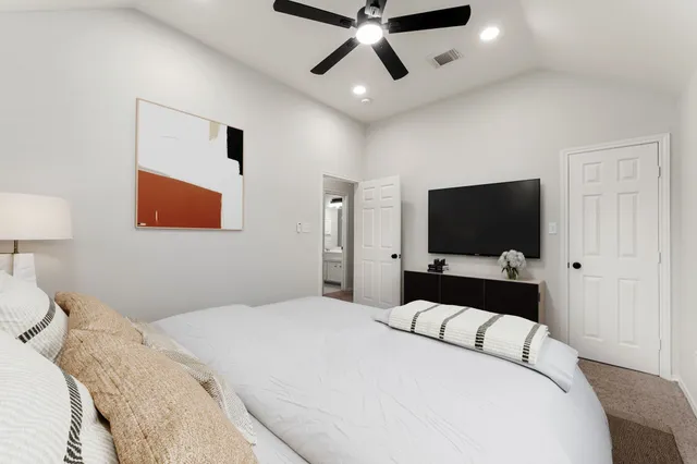 a bathroom with a sink double vanity granite tub and shower