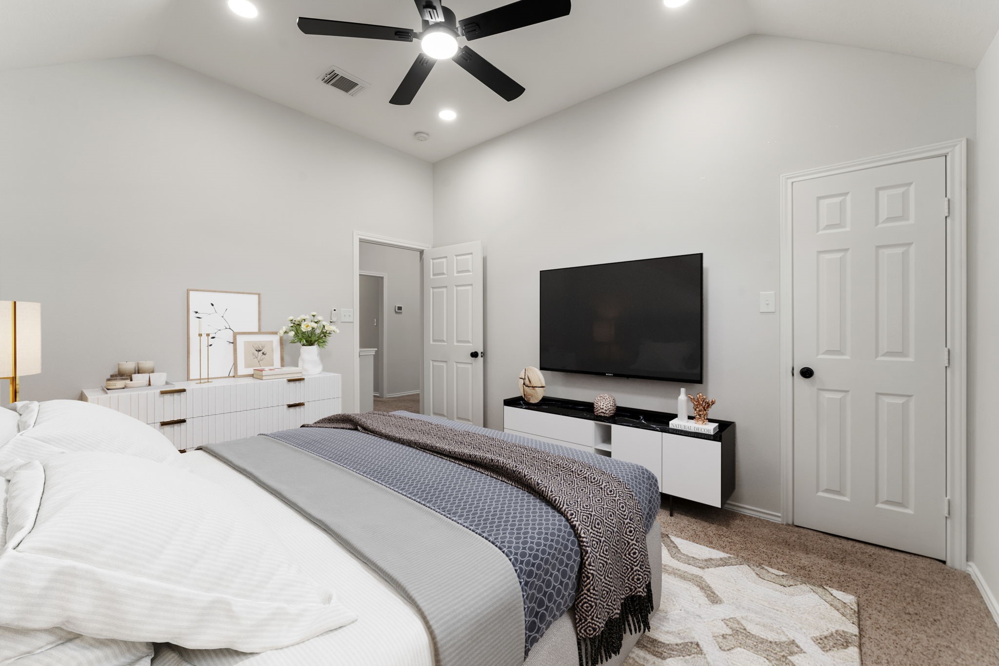 22 Crestview Trail Houston, TX 77082 - Photo 25 of 39 a bedroom with a bed and a flat screen tv