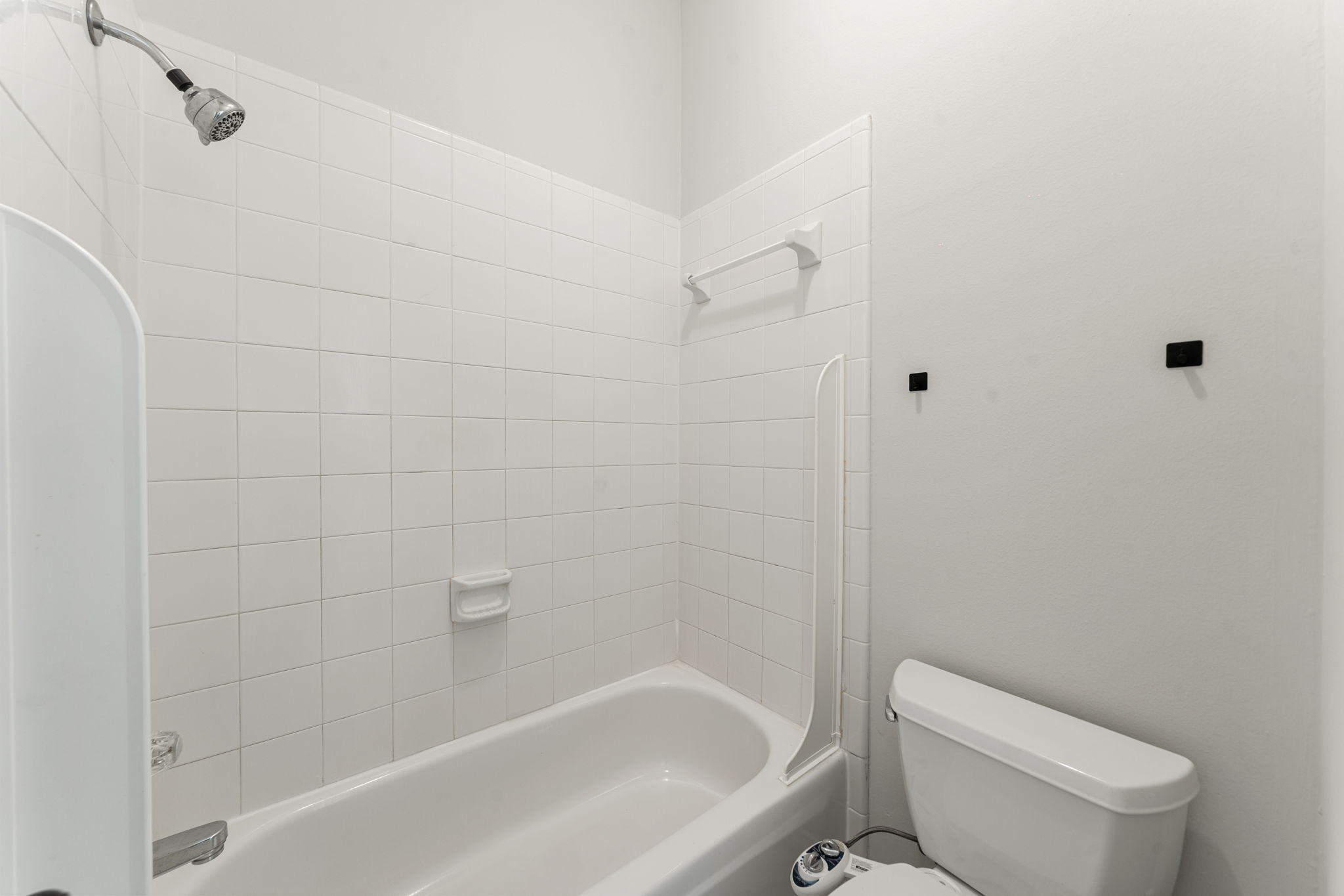 22 Crestview Trail Houston, TX 77082 - Photo 26 of 39 a white bath tub sitting next to a white toilet and sink