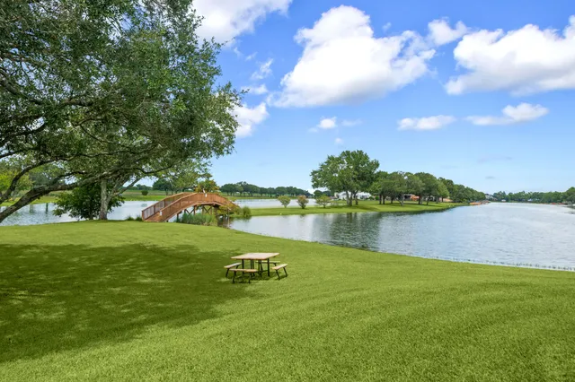 a view of an outdoor space and tennis court