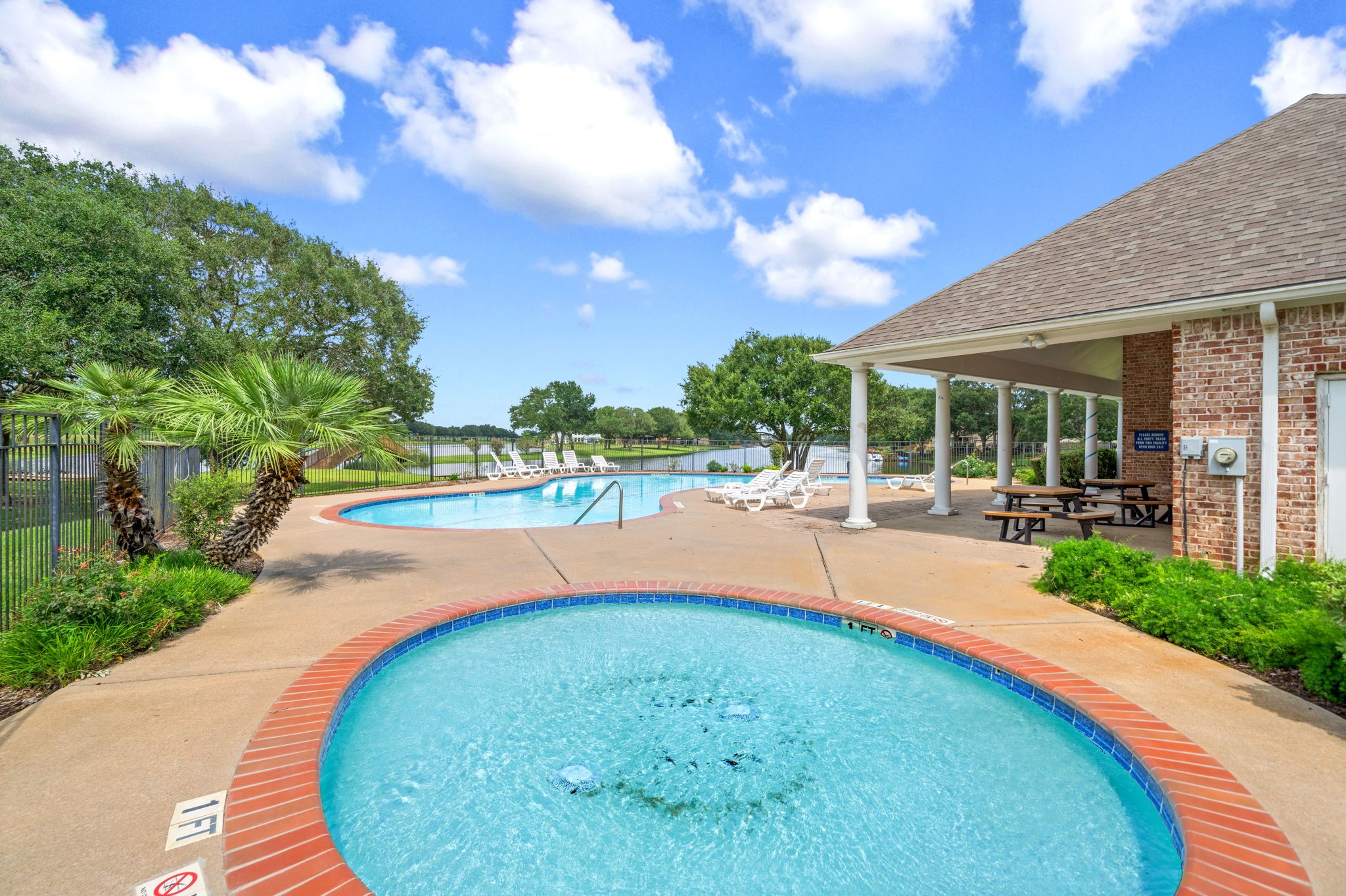 22 Crestview Trail Houston, TX 77082 - Photo 37 of 39 a view of a swimming pool with a patio
