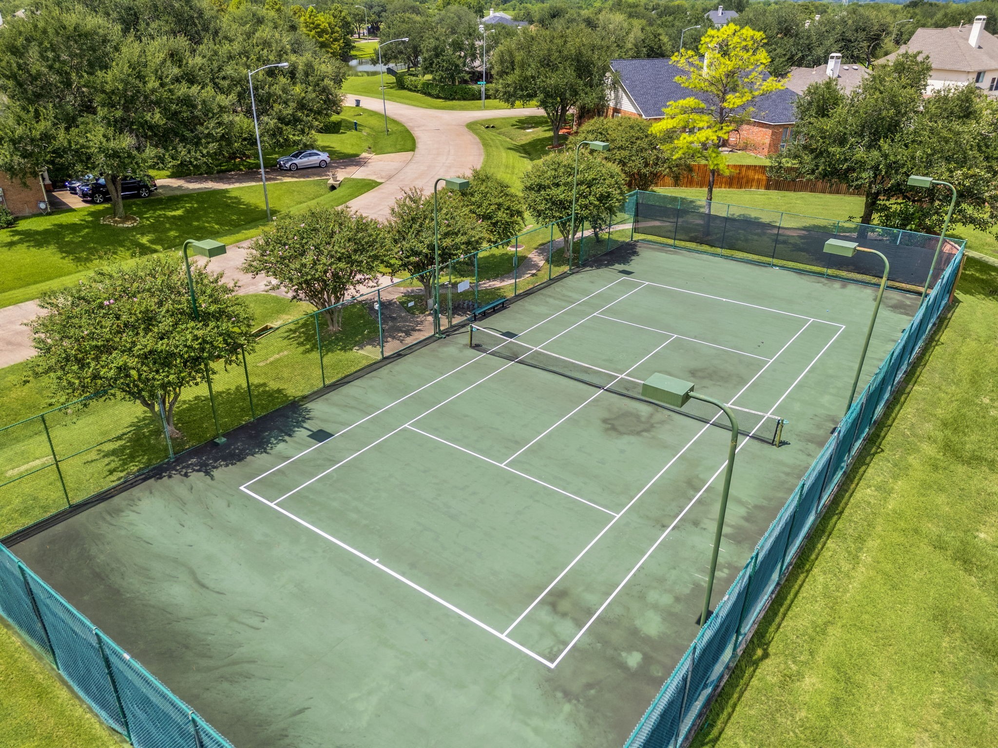 22 Crestview Trail Houston, TX 77082 - Photo 38 of 39 a view of an outdoor space and tennis court