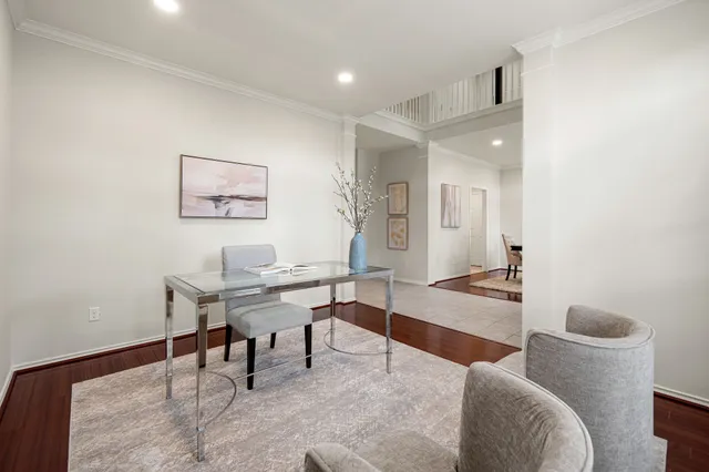 a workspace with furniture and window